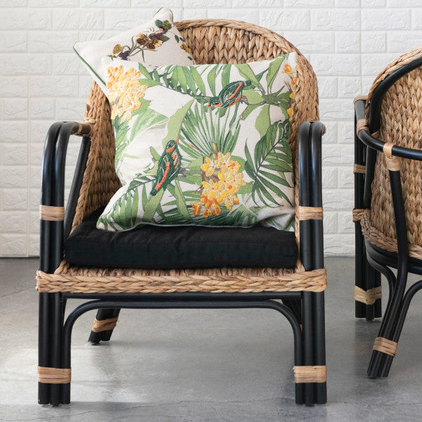 A rectangular cotton lumbar pillow on chair